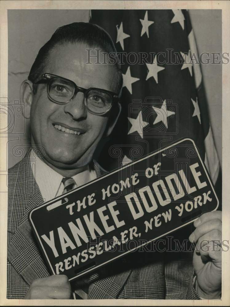 1964 Press Photo Douglas Gibson Poses with Specialty License Plate, Rensselaer - Historic Images
