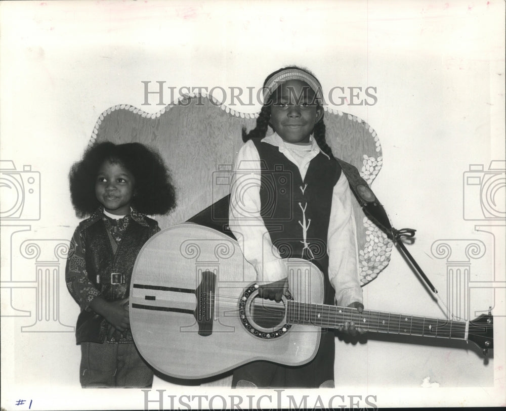 1978 Carlton and Gary Winslow pose with guitar in Albany, New York - Historic Images