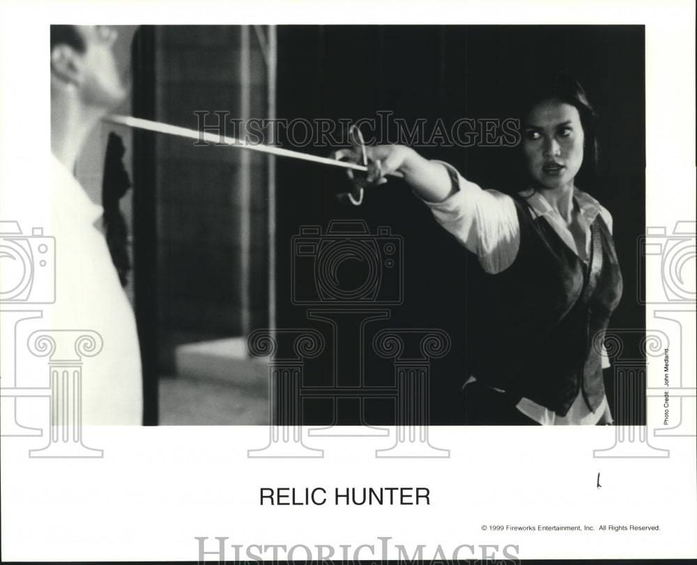 1999 Press Photo Tia Carrere stars in Relic Hunter - tup01738 - Historic Images