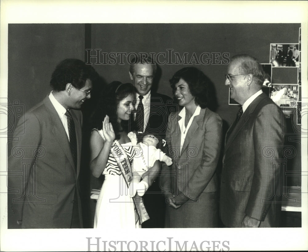 1983 Miss Teen New York Ruth Zakarian receives Cabbage Patch Doll - Historic Images