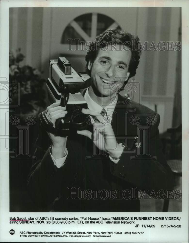 1990 Bob Saget hosts &quot;America&#39;s Funniest Home Videos&quot; on ABC-TV - Historic Images