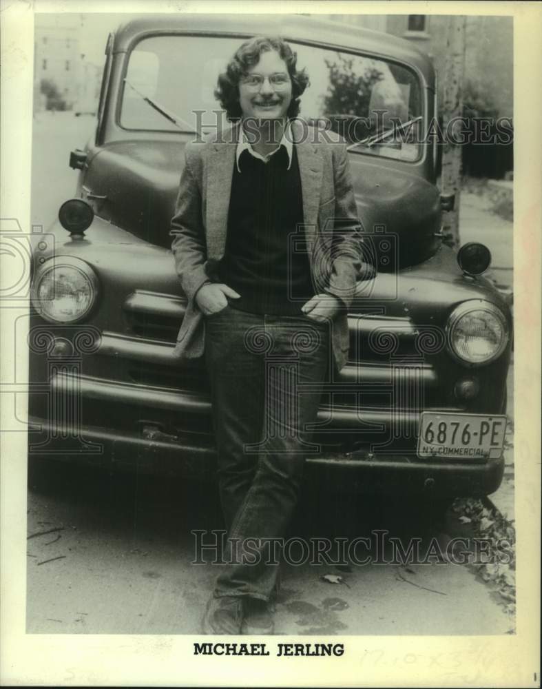 1979 Press Photo Michael Jerling leaning on hood of truck - Historic Images