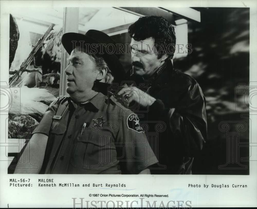 1987 Press Photo Kenneth McMillan &amp; Burt Reynolds costar in &quot;Malone&quot; - Historic Images