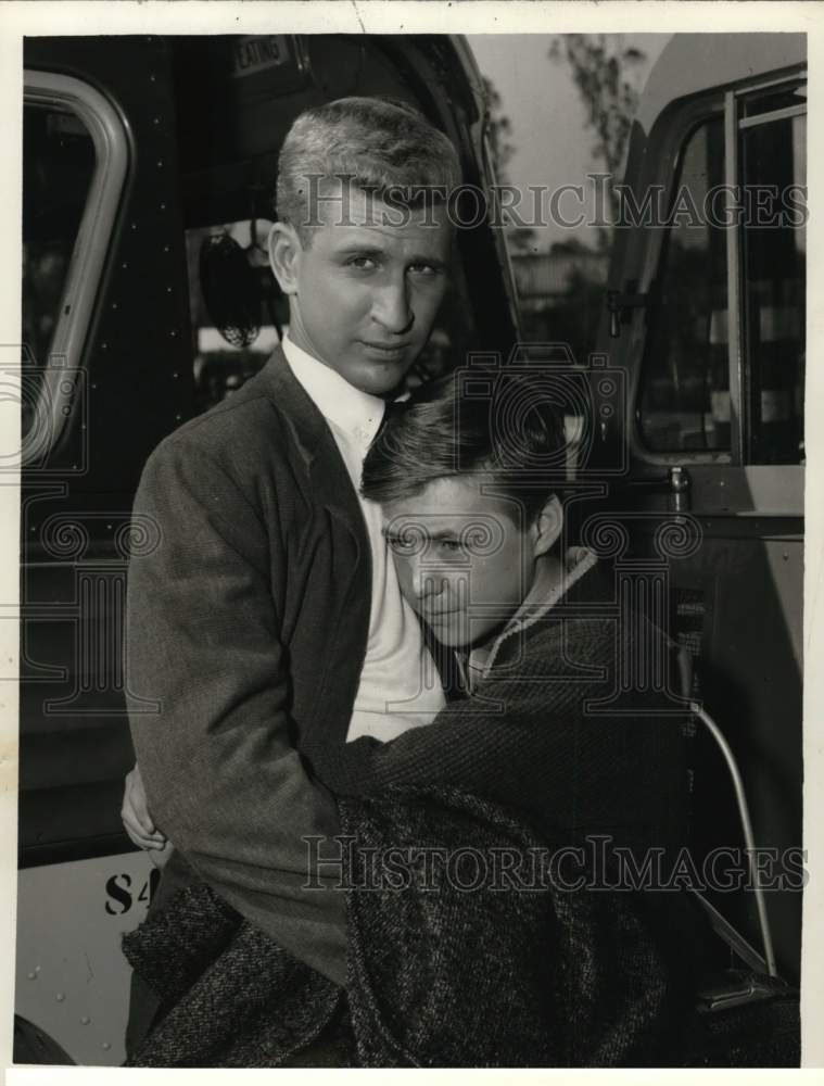 Press Photo Costars hug in scene from movie - Historic Images
