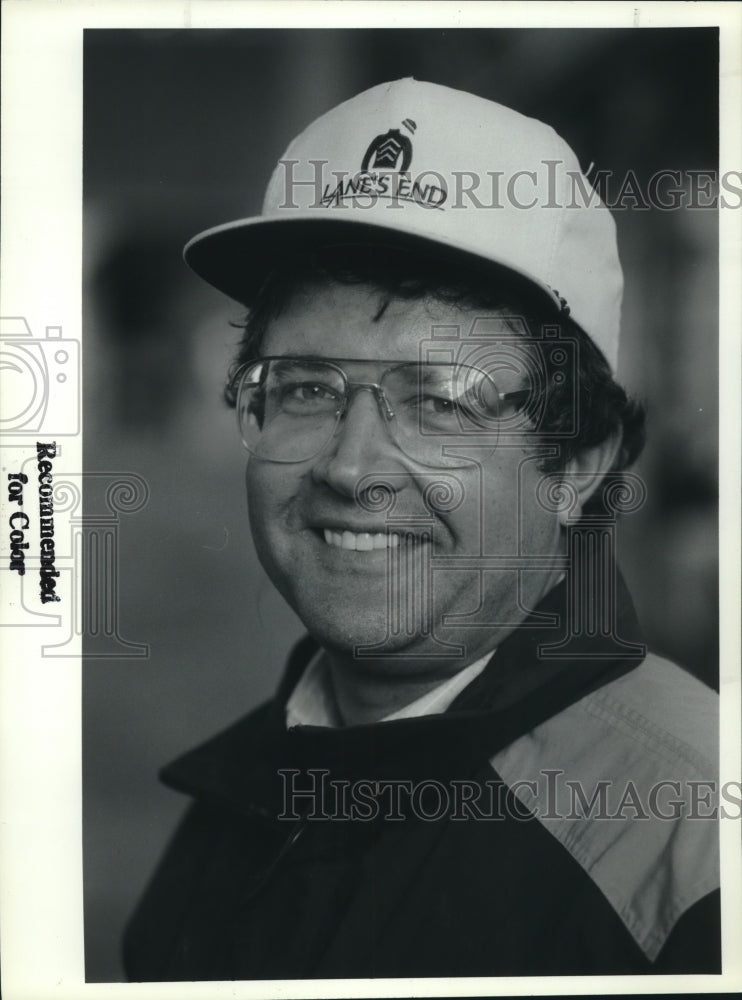 Dennis Brida smiles wearing a &quot;Lane&#39;s End&quot; hat - Historic Images