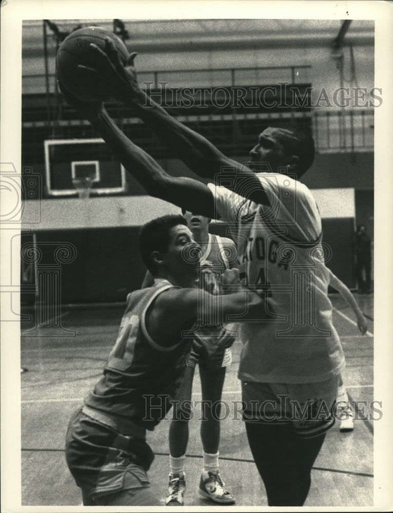 Press Photo Saratoga basketball player Tim Parker holds basketball during game - Historic Images