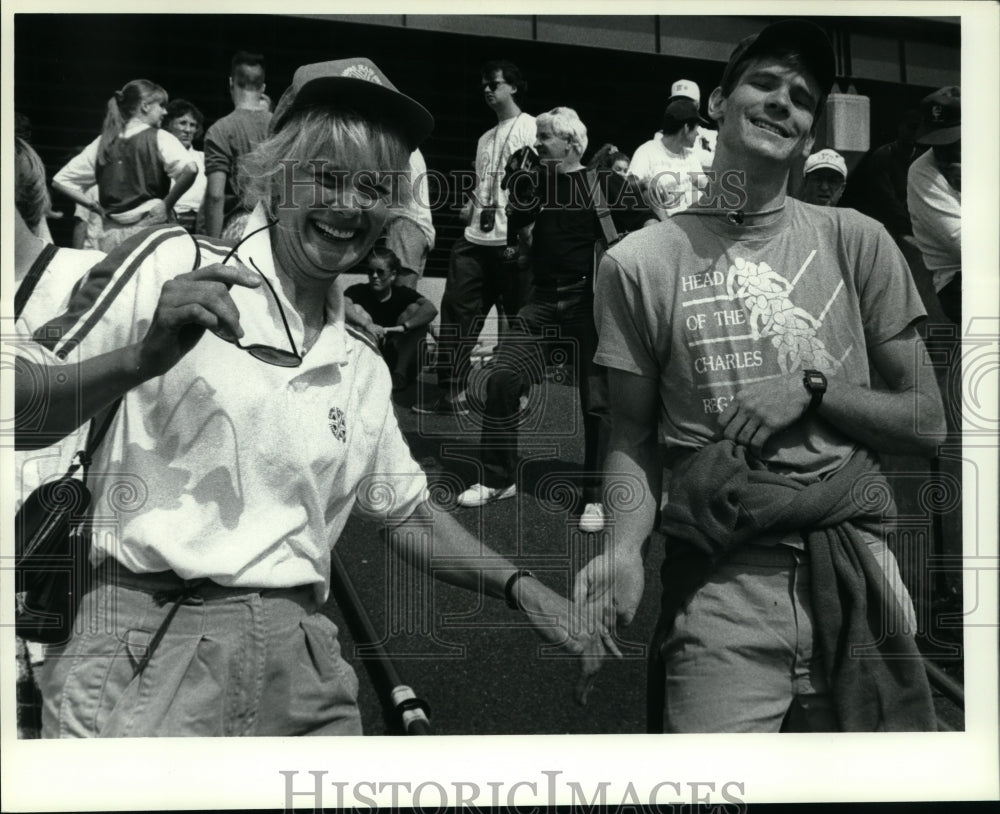 Athletes walk through crowd at Empire State Games, Albany, New York - Historic Images