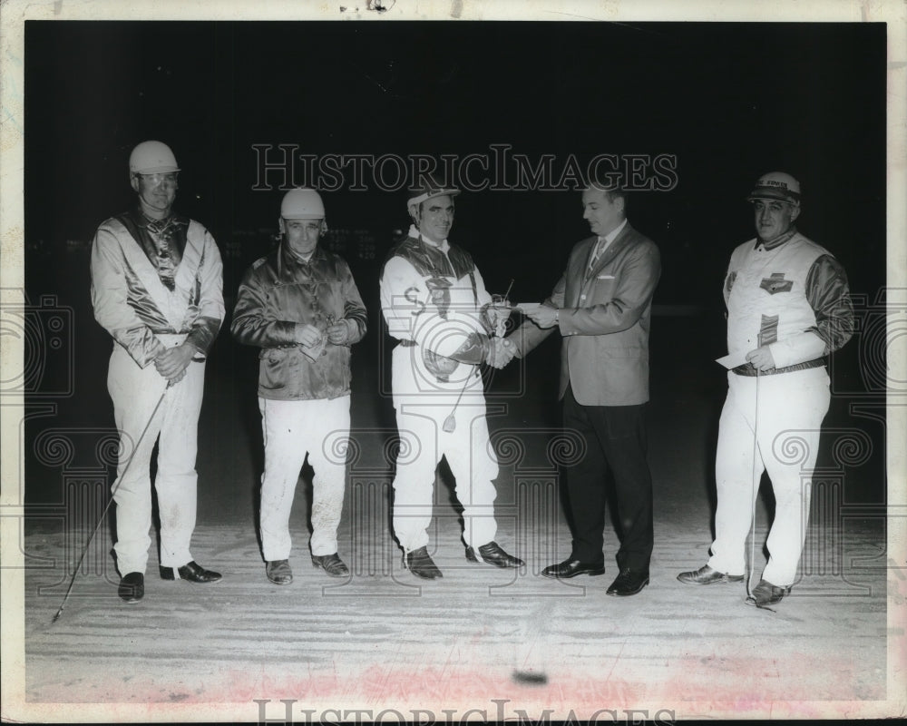 1970 Press Photo Several jockeys receive checks at Saratoga Harness Track, NY- Historic Images