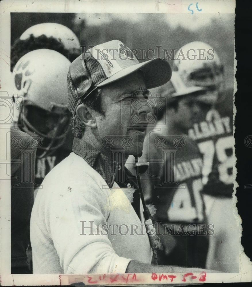  SUNYA Football Coach Bob Ford on sidelines with players in game - Historic Images