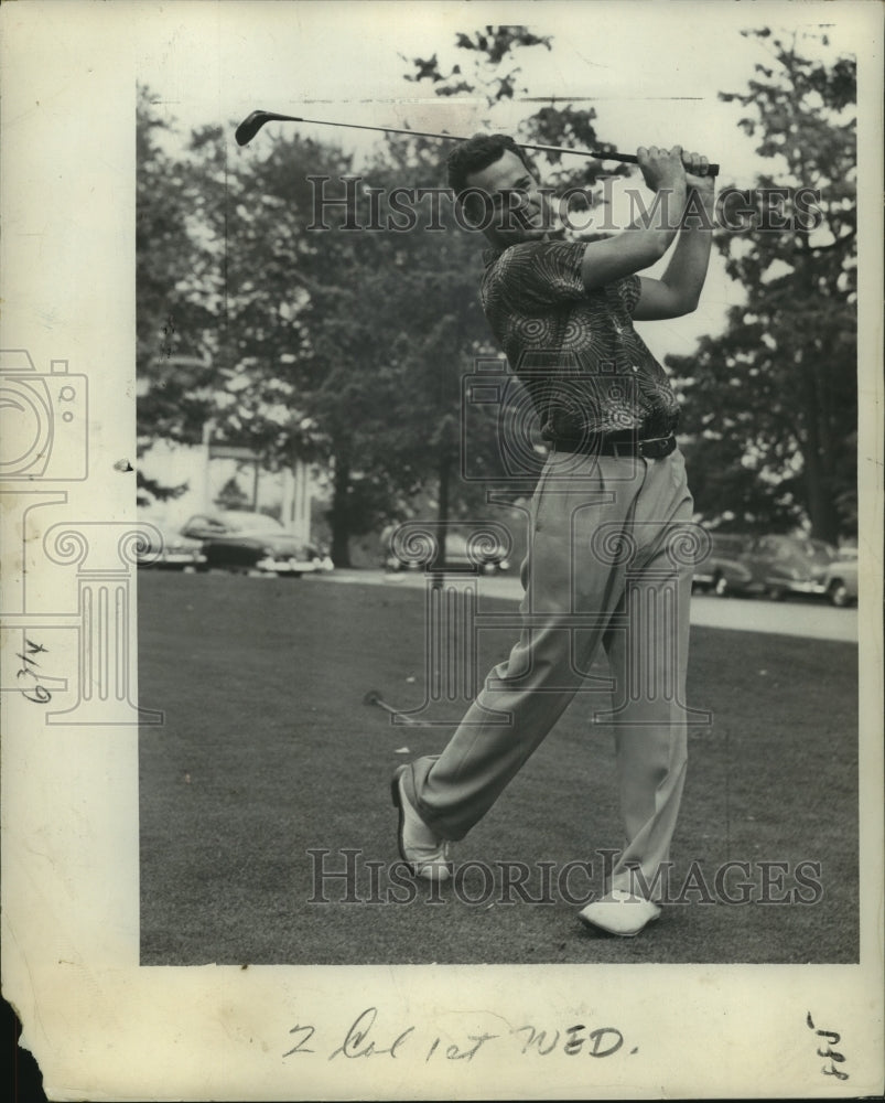 Lou Witt swings driver in golf tournament at Wolferts Roost, NY - Historic Images