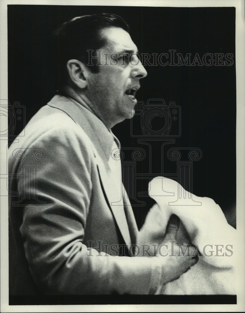 Siena College Basketball Coach Bill Kirsch holds a towel in hands - Historic Images