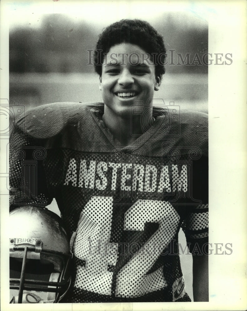 Press Photo Amsterdam football player #42 Justice Smith smiles for camera - Historic Images