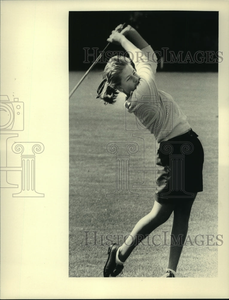 Press Photo Golfer Casey Murphy watches ball after swing at Colonie, New York - Historic Images