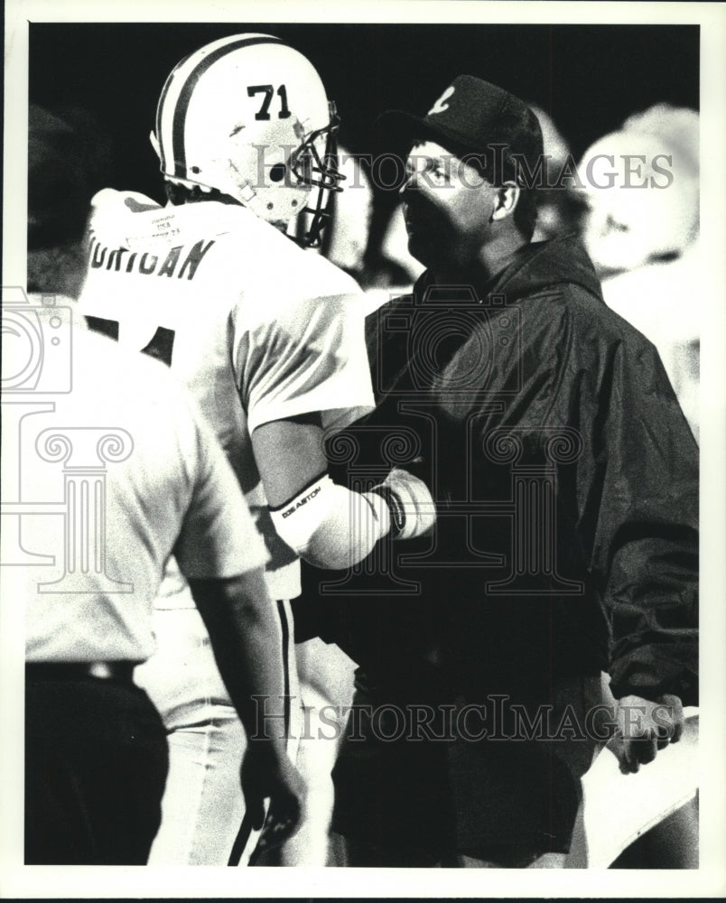 Lansingburgh football coach John Diehl talks with his player #71 - Historic Images