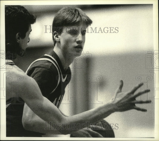 1989 Press Photo Bishop Maginn basketball player Terrence Word drives around