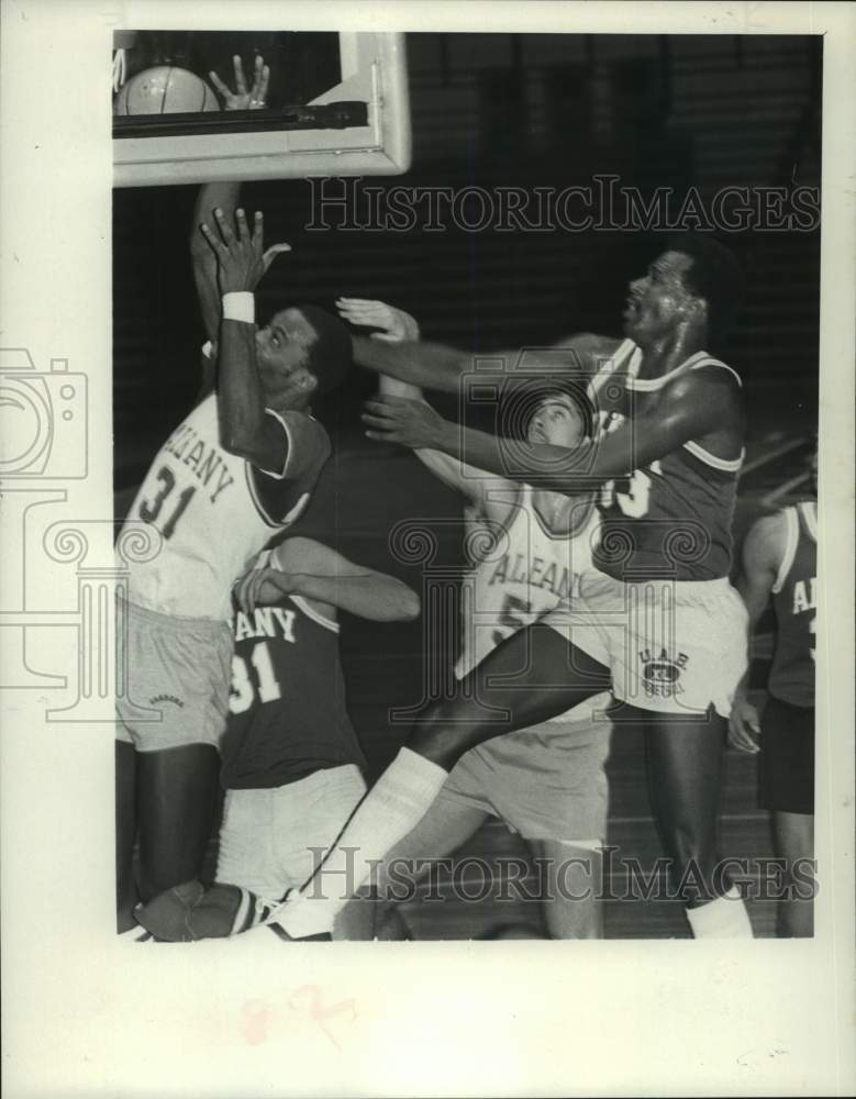 Press Photo Albany basketball players battle for control of rebound in practice- Historic Images