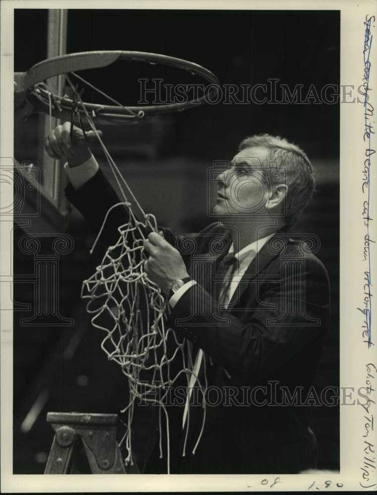 Press Photo Coach Mike Deane cuts down net after basketball win in New York - Historic Images