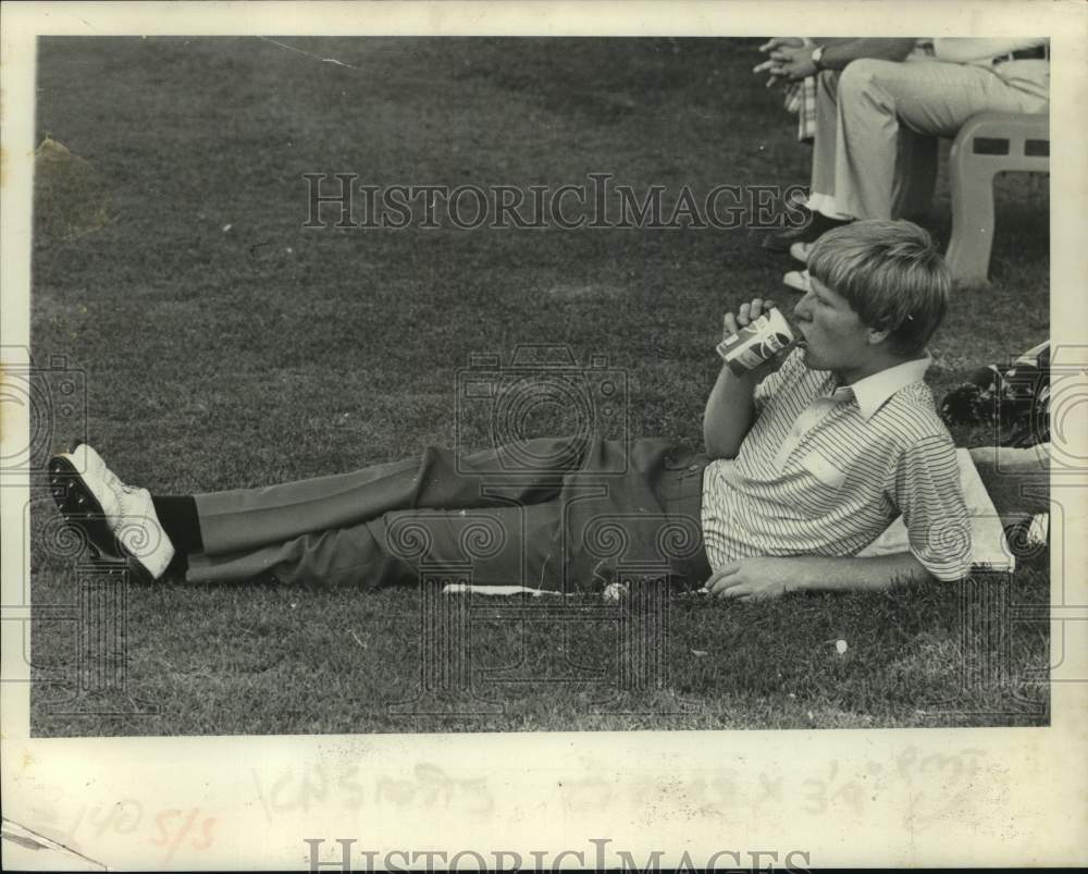 Paul Royak takes break during round of golf in New York - Historic Images