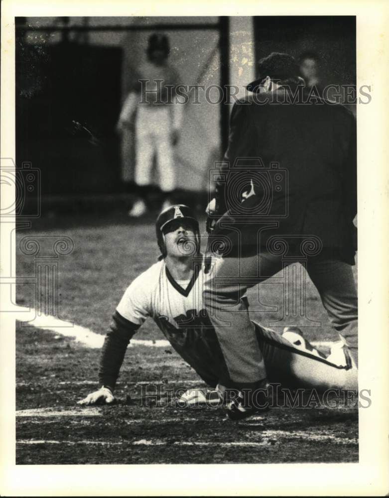 1984 Press Photo A baseball player slides into home plate - tus06036- Historic Images