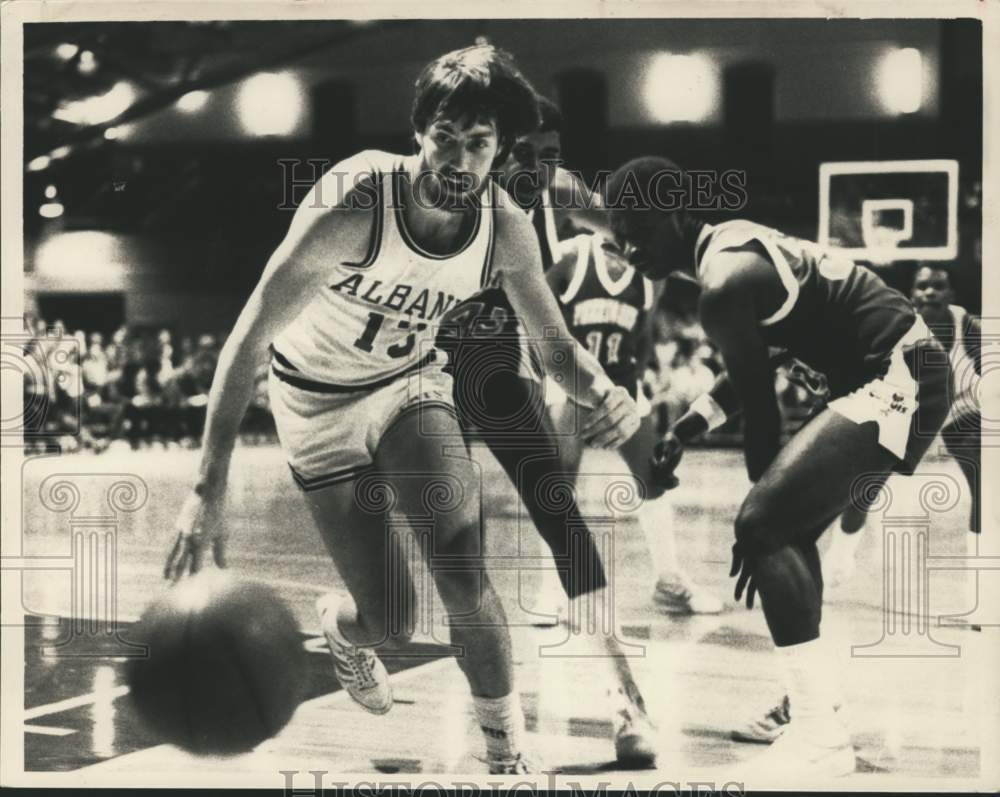 Press Photo Albany basketball player in action - tus06128- Historic Images