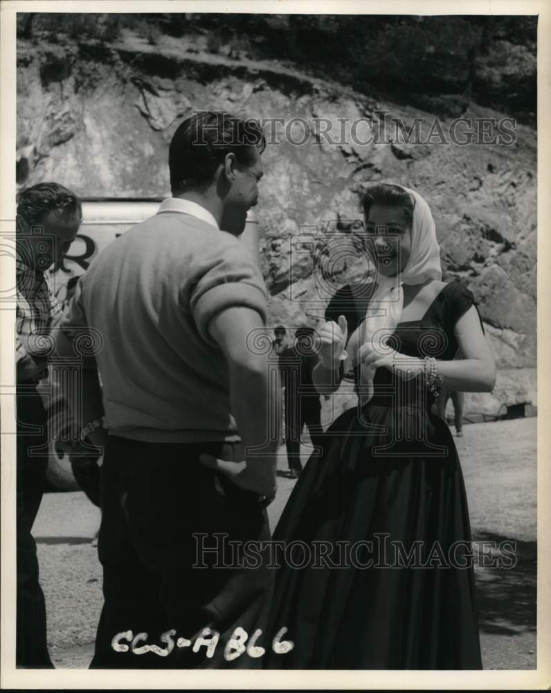 1957 Richard Todd costars with Anne Baxter in movie scene-Historic Images